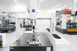 Coordinate measuring machine checking a machined part