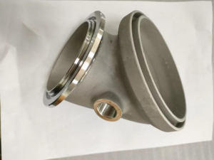 Machined stainless steel valve body casting with flange faces and threaded port